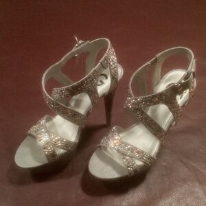 Guess 5 inch Sandals with brass, silver, and gold metal details